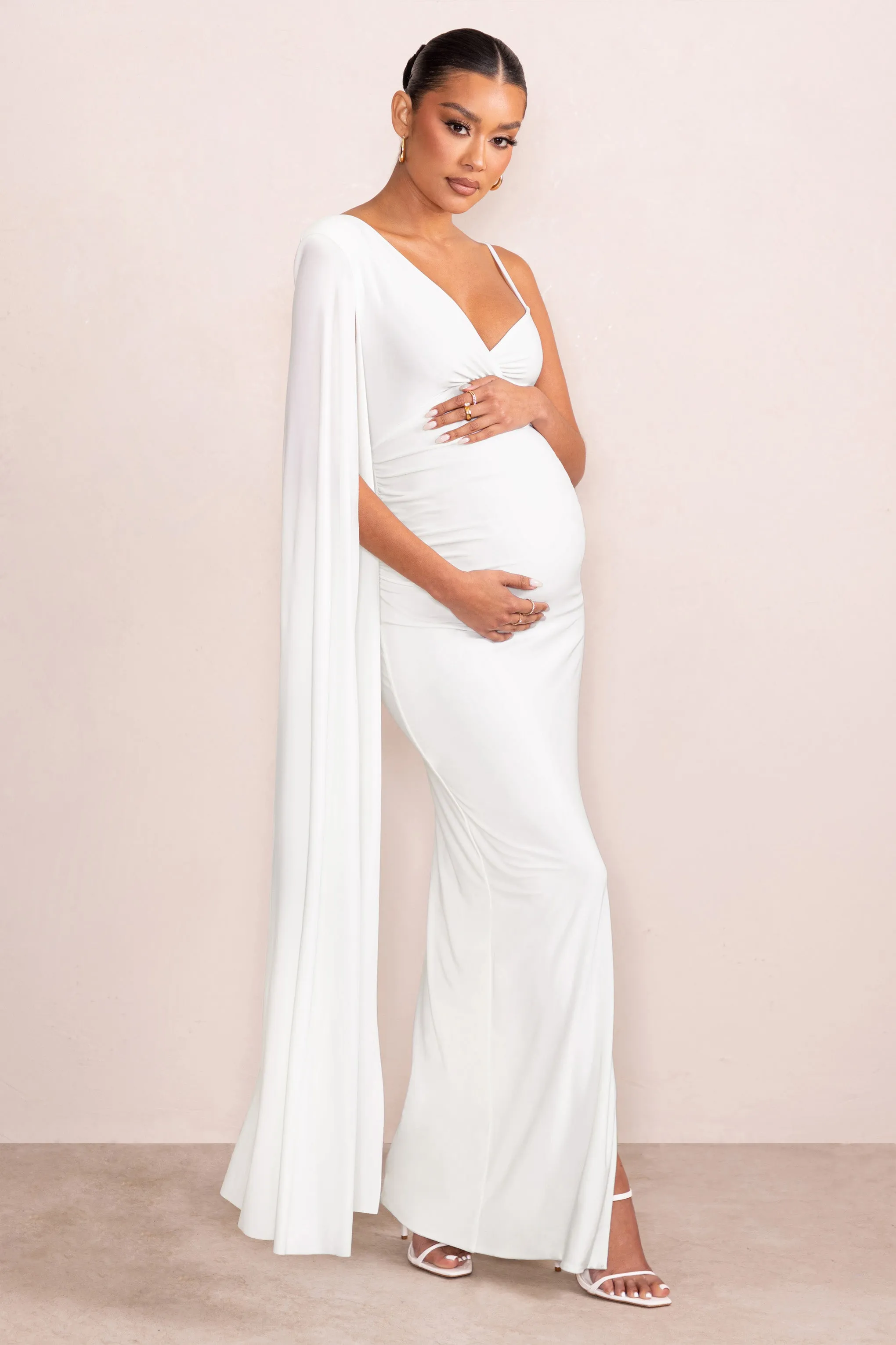 The Crown | White Asymmetric Plunge Maternity Maxi Dress with Cape Sleeve